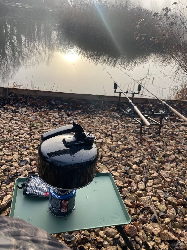 Peaceful lakeside fishing setup